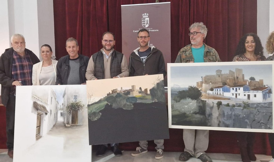 Los tres premiados por la izquierda el segundo, primero y tercer premio